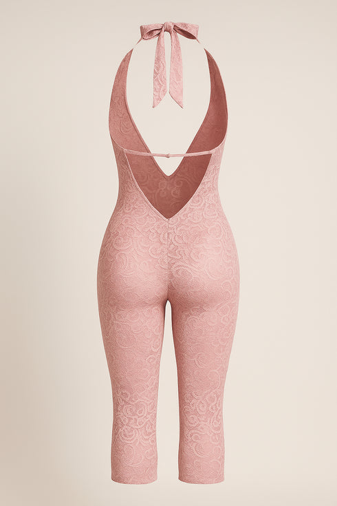 Pink lace bodysuit on a beige background
