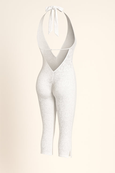 White lace bodysuit on a light beige background