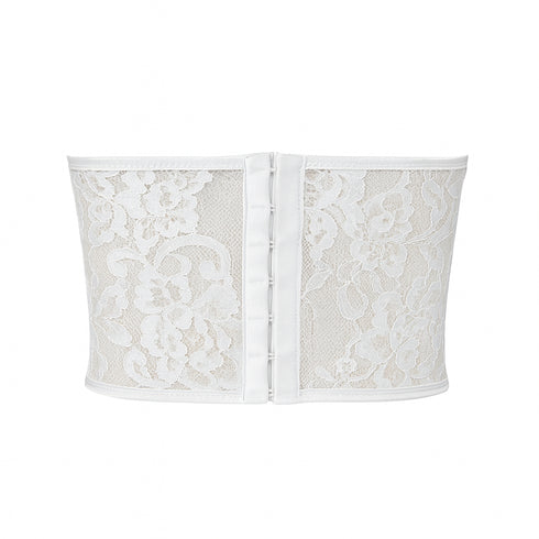 White lace corset on a white background