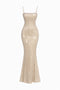 Beige evening gown with grid pattern on a white background