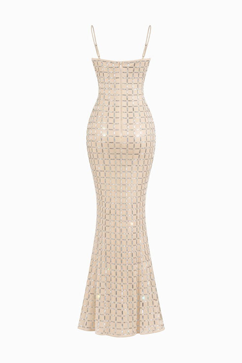 Beige evening gown with a textured pattern on a white background