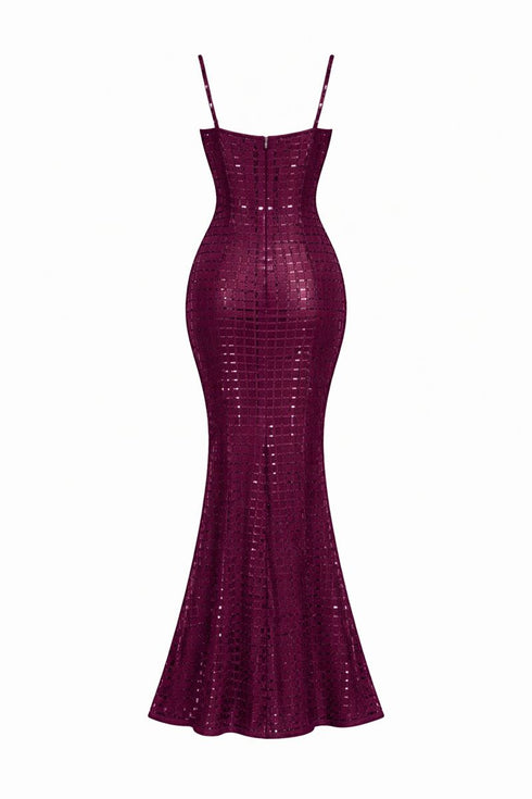 back of purple evening gown with sequin detailing on a white background