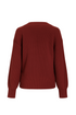 Red sweater on a light gray background