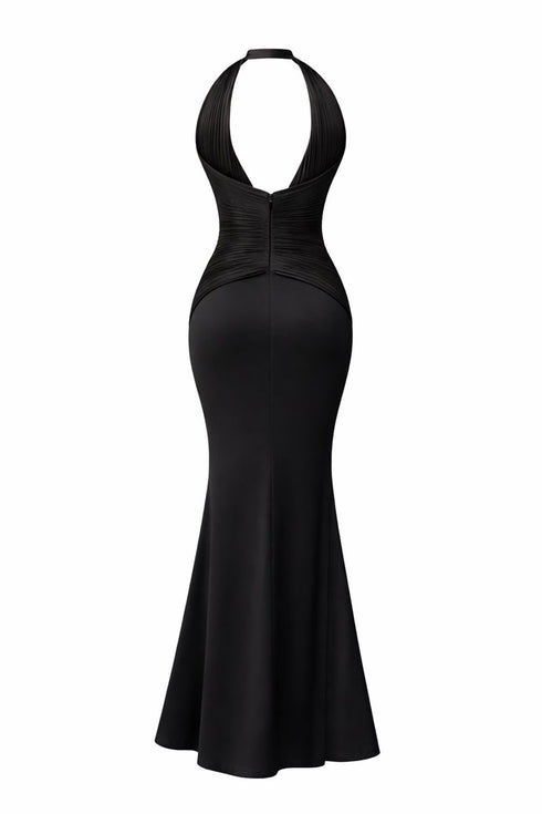Back of Black halter neck dress on a white background