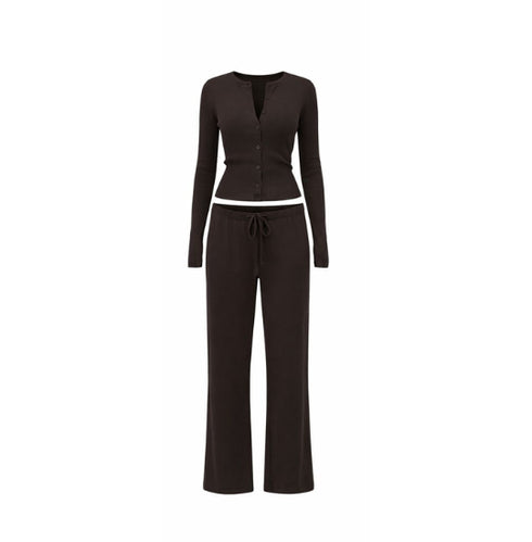 Black long-sleeve top and pants set on a white background