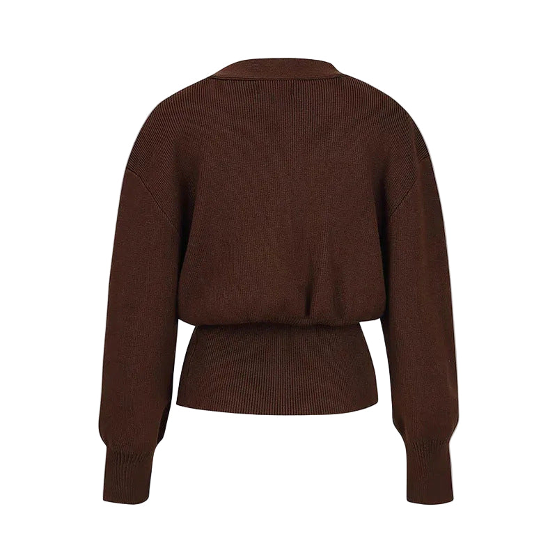 Brown sweater on a light gray background