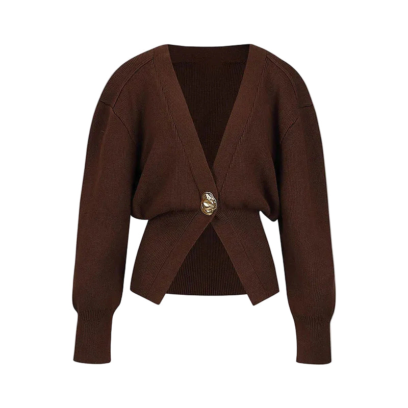 Brown knitted cardigan with a gold button on a light gray background